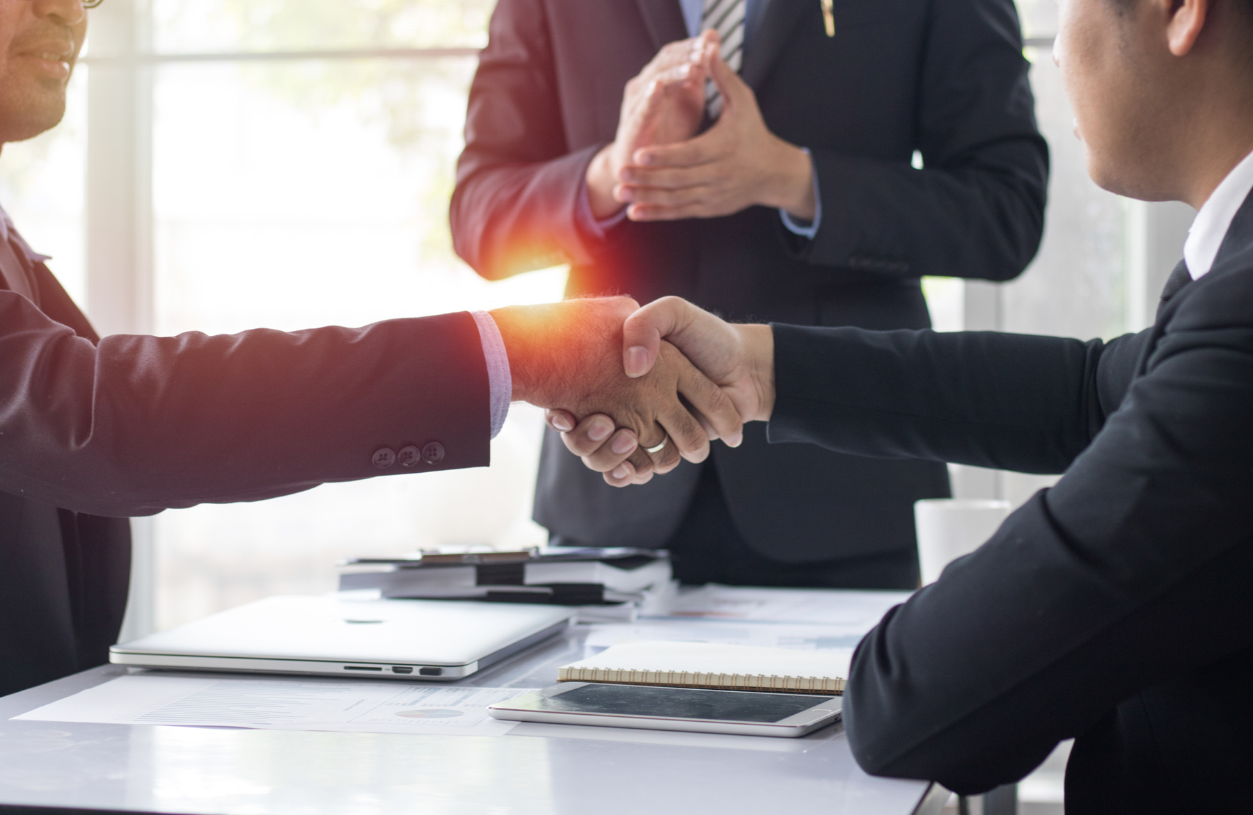 Business People Shaking Hand to Cooperate and Deal in Business S